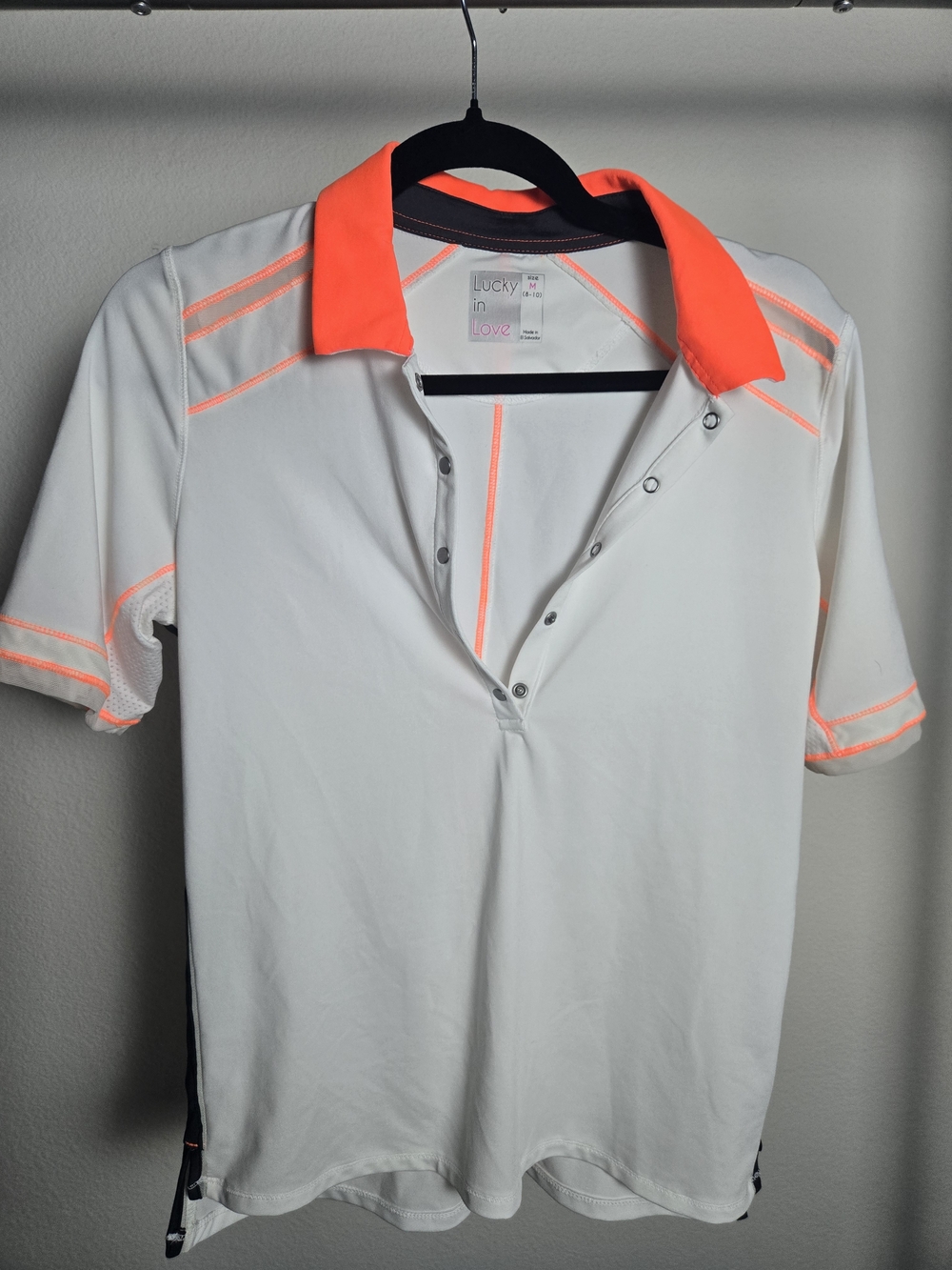Lucky in Love White Polo with Neon Orange Accents